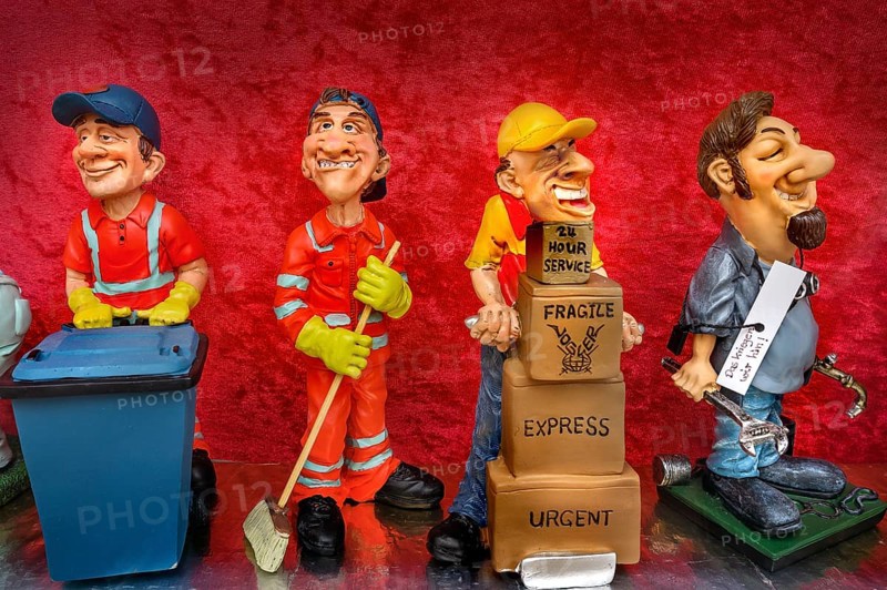 Funny ceramic figurines with different professions