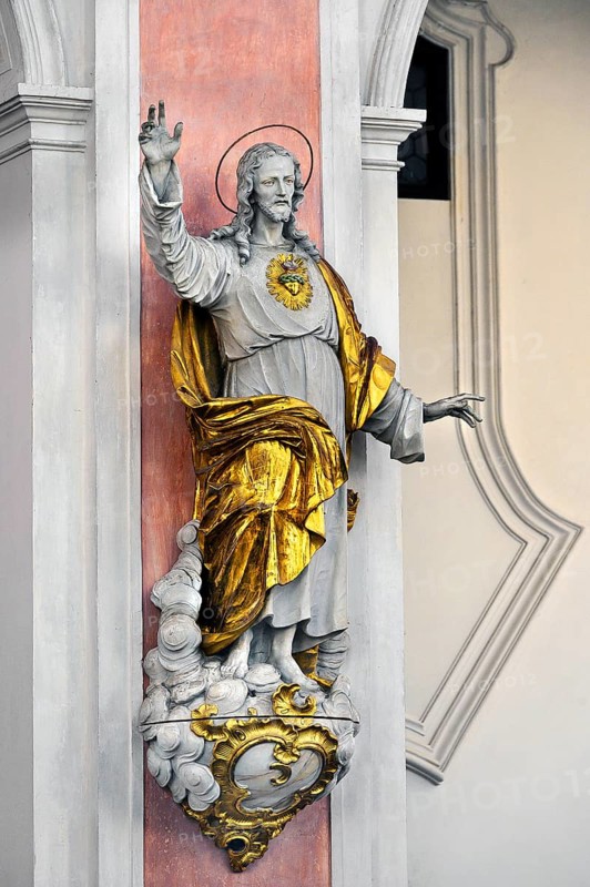 Christ figure with radiating heart