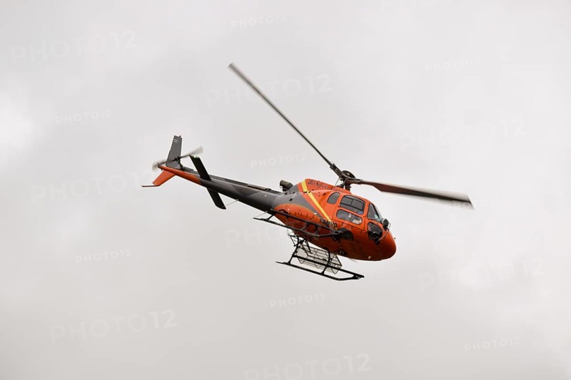 Aerospatiale 350B3 Ecureuil helicopter from the Air Service Centre on a supply flight to the Magdeburger Huette in the Stubai Alps