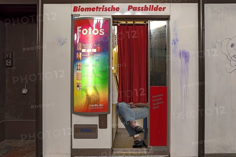 Vending machine for passport photos in a public department stores'