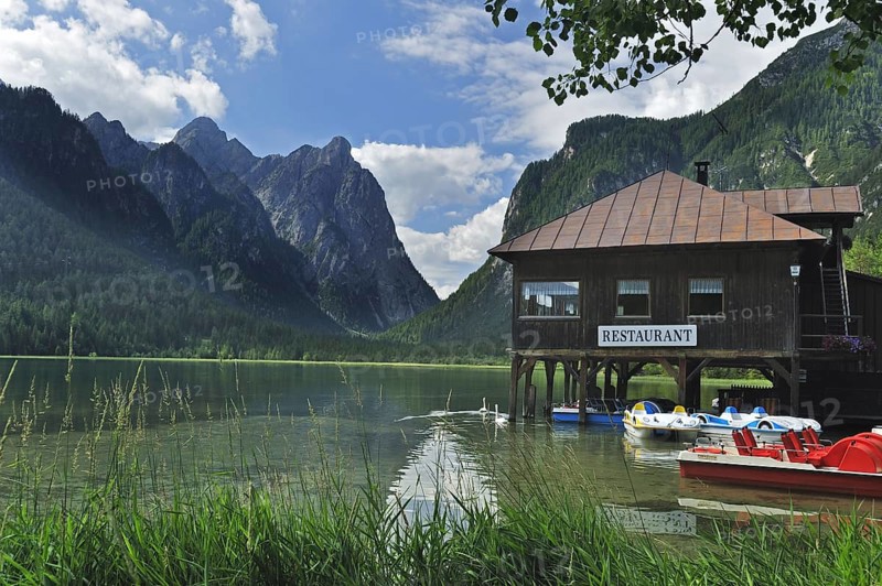 Restaurant and pedal boats along the lake Lago di Dobbiaco