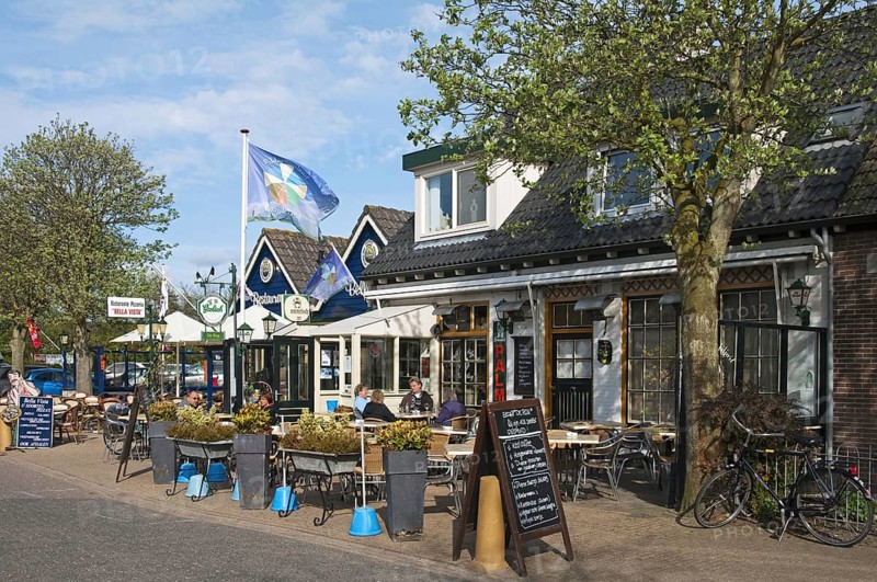 Tourists on pavement cafe at Cocksdorp