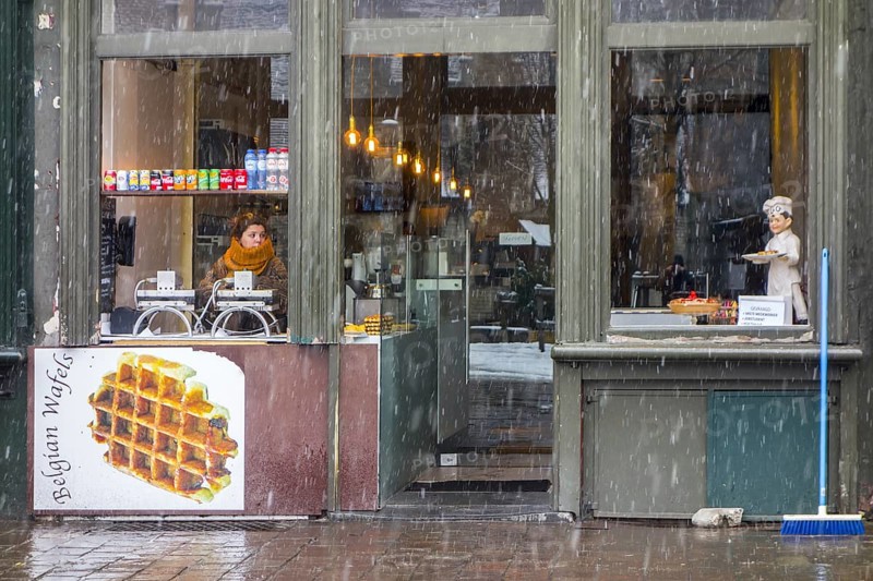 Vendor of Belgian waffles waiting for customers