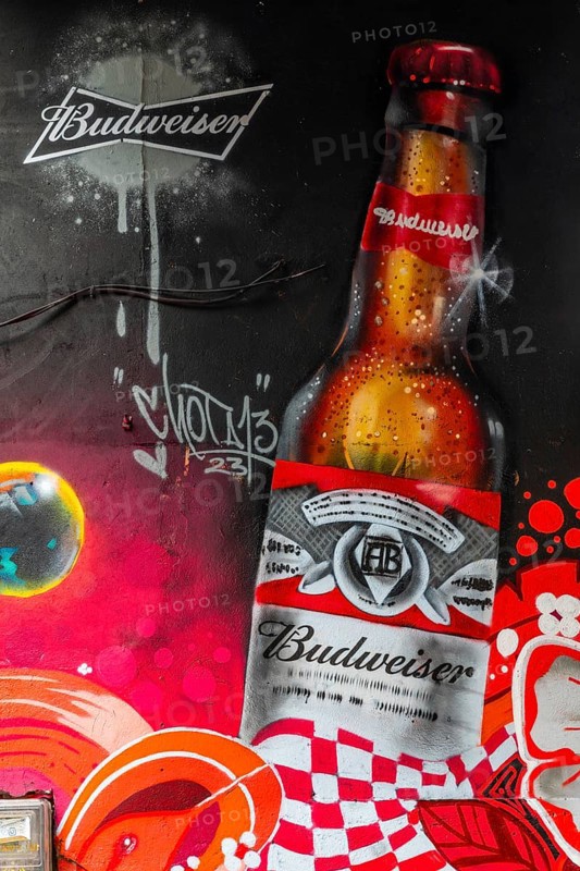 Beer bottle graffiti on the walls of a house