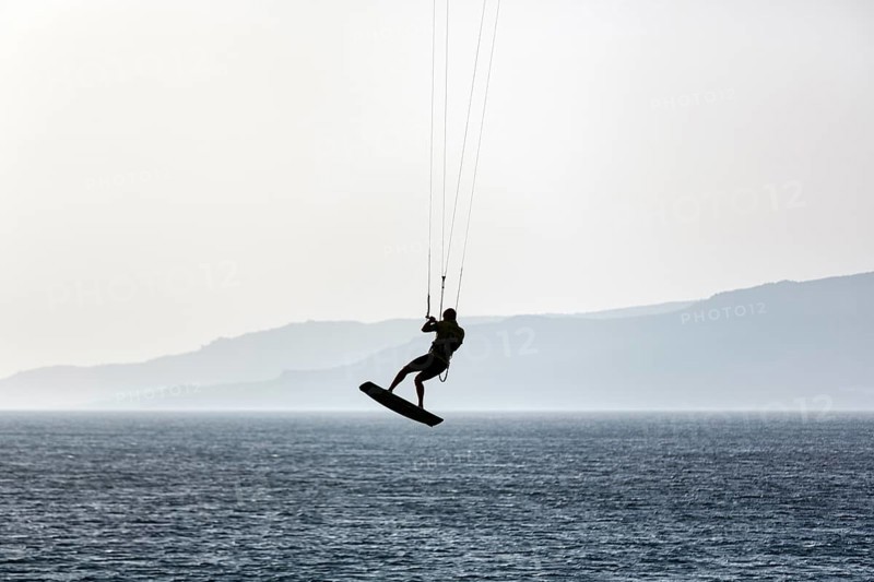 Kitesurfer jumping