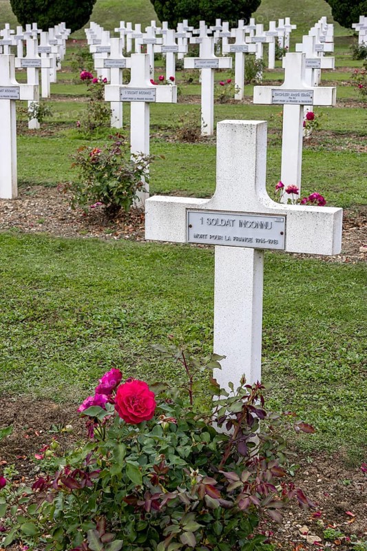 French military cemetery at the Ossuaire de Douaumont with white graves and crosses of fallen soldiers