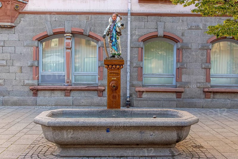 Narrobrunnen fountain with bronze Narro sculpture
