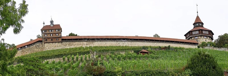 Panoramic photo of the medieval town wall with the castle wall