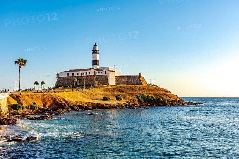 Sunset at the famous Farol da Barra in the city of Salvador