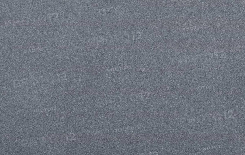Grey metal background with shiny speckles
