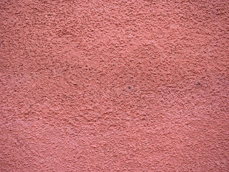 Red plaster wall background