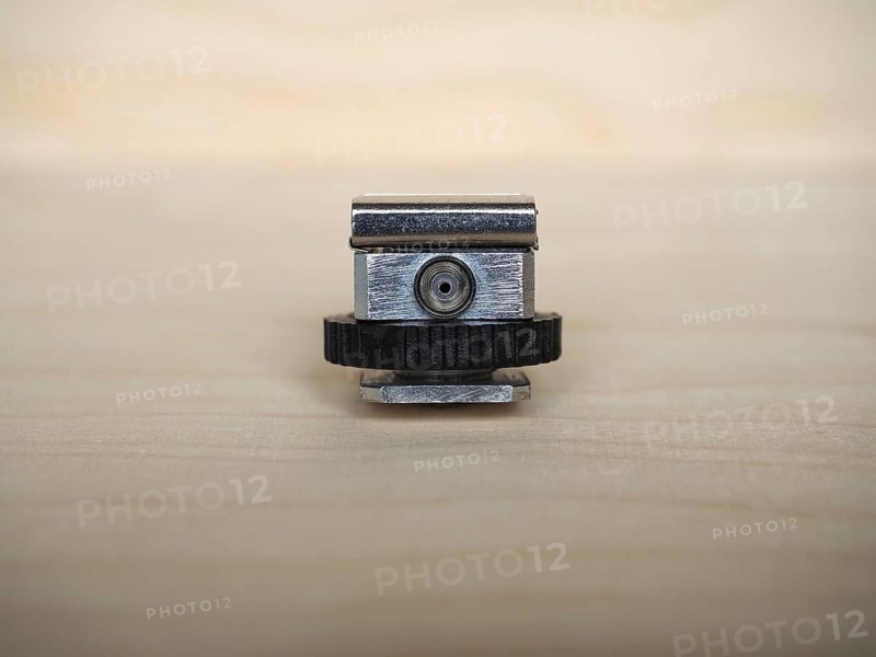 Camera hot shoe adapter