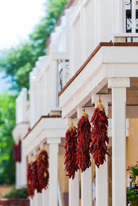 Chilli peppers on a house porch