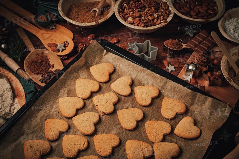 Heart-shaped biscuits baked on a baking tray