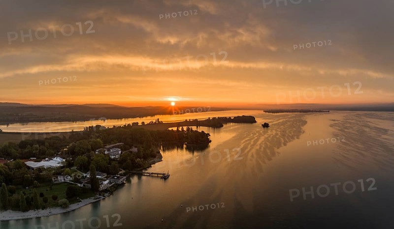 Aerial panorama of western Lake Constance at sunrise with the Mettnau peninsula