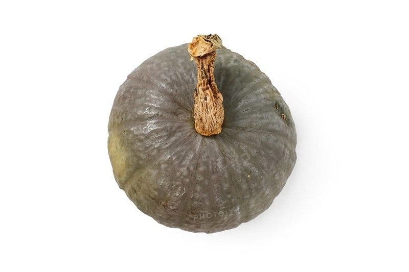 Top view of blue Kuri squash on white background