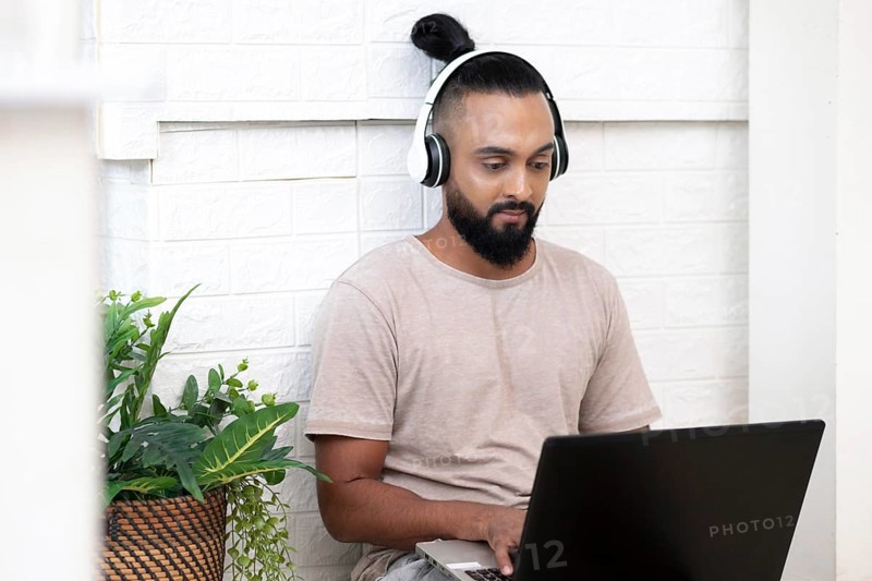 Medium shot man with laptop