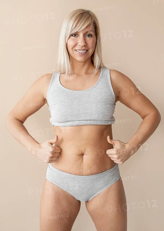 Medium shot woman with thumbs up