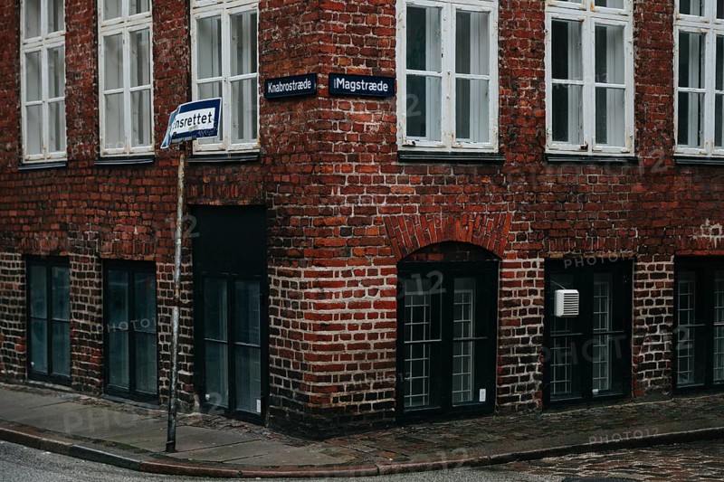 Old building corner paved street