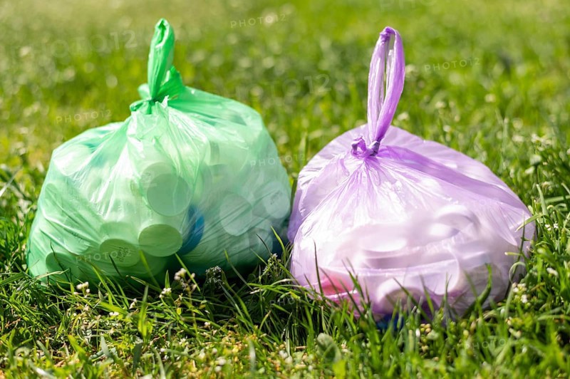 Plastic bags with trash grass