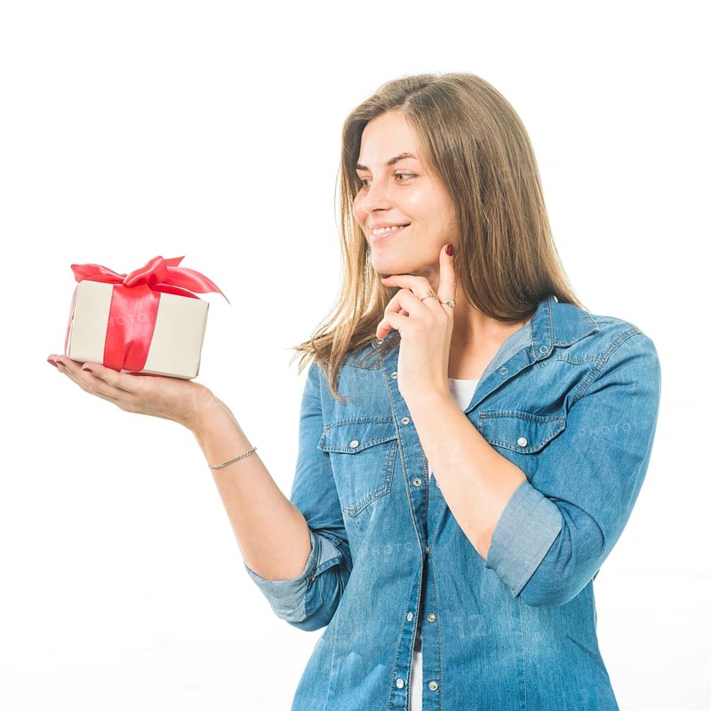 Portrait happy woman looking gift white background