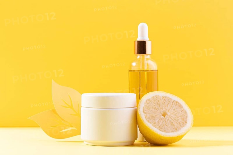 Serum bottle with yellow background