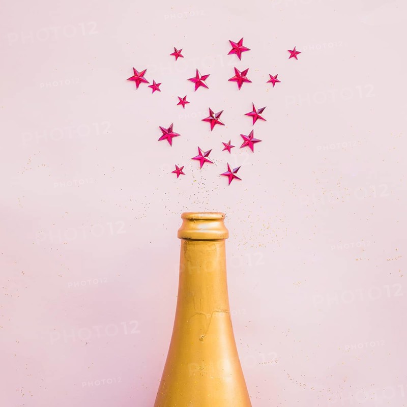 Spangles scattered from bottle