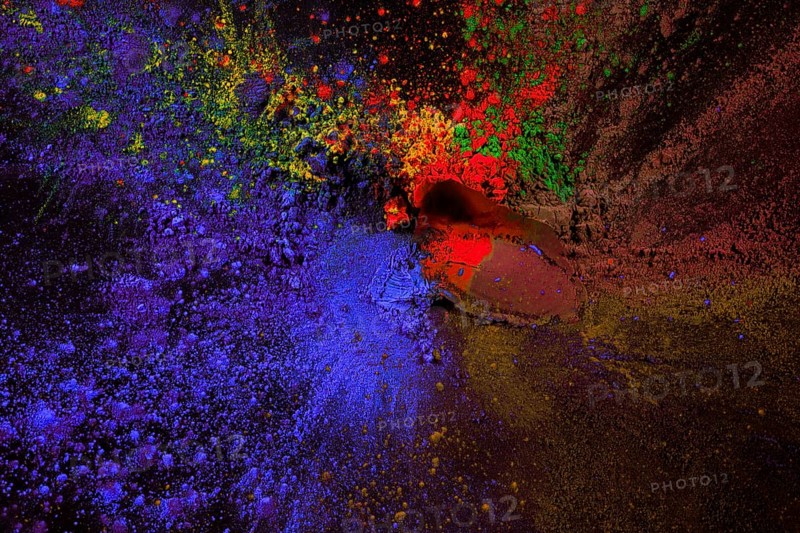 Splatter holi color powder black surface