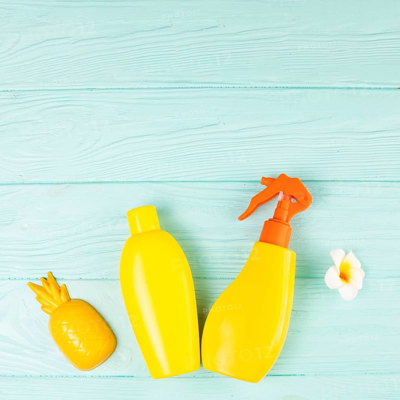 Spray bottles with toy flower