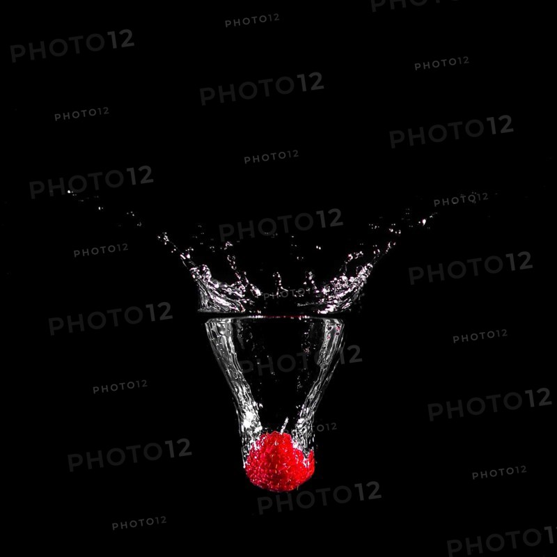 Strawberry plunging into water