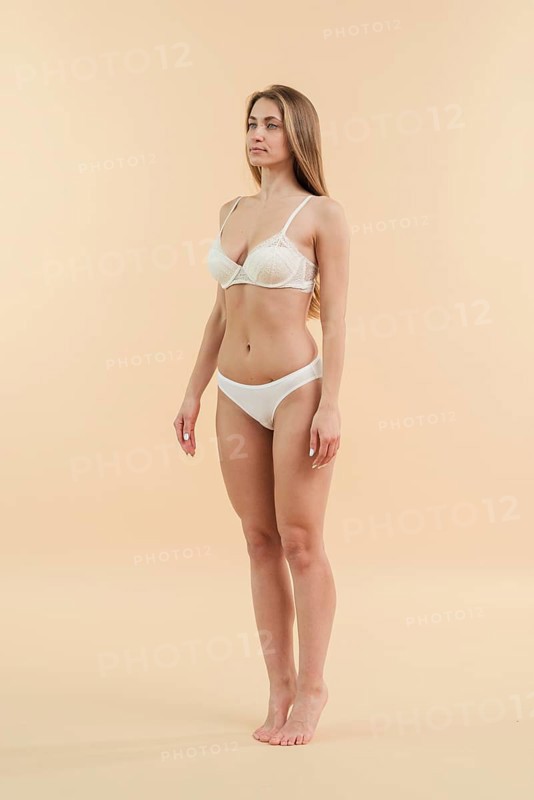 Young blond woman posing underwear