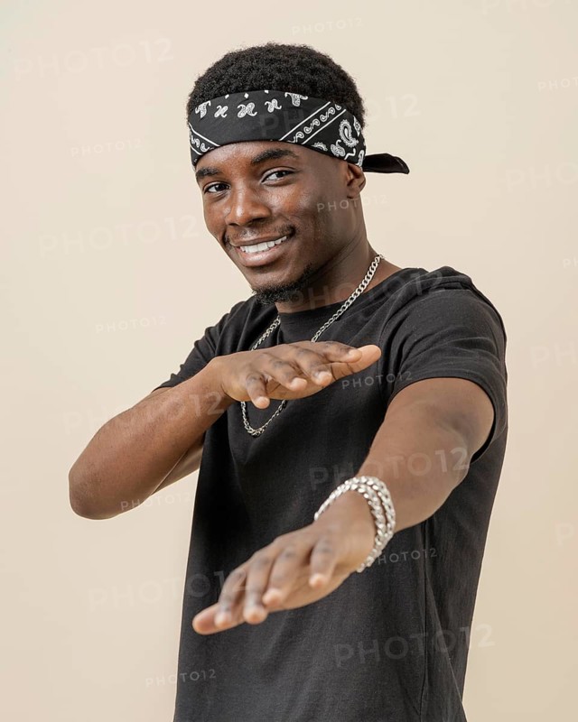 Young handsome man posing with bandana