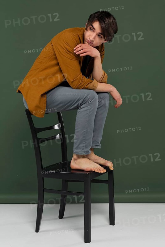 Young man wearing shirt posing chair 4