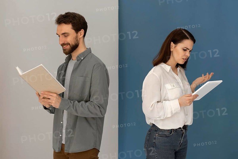 Back back man with book woman with tablet