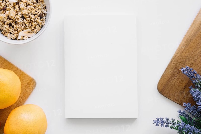 Book cover mockup with oranges flowers
