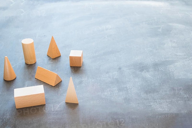 Desktop with wooden geometrical shapes