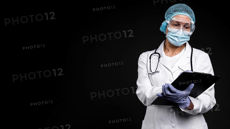 Doctor wearing medical equipment with copy space