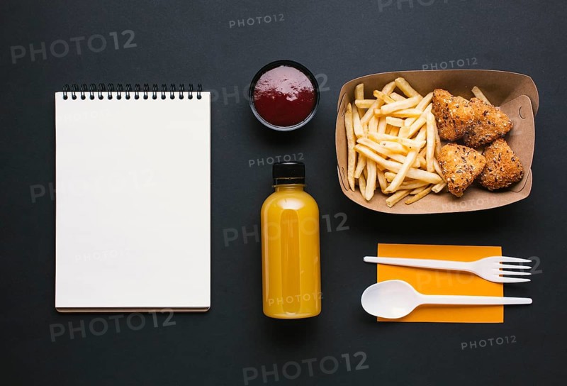 Flat lay assortment with fries notebook