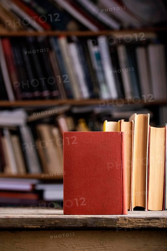 Front view hardback books with copy space library
