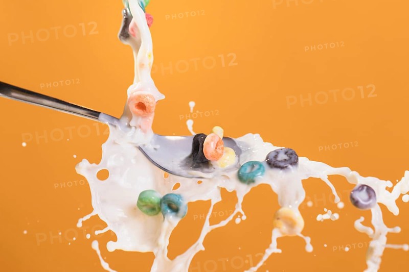 Front view milk cereals splash