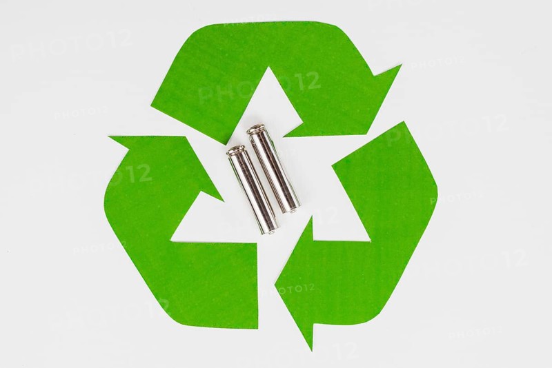 Green eco recycle symbol used batteries