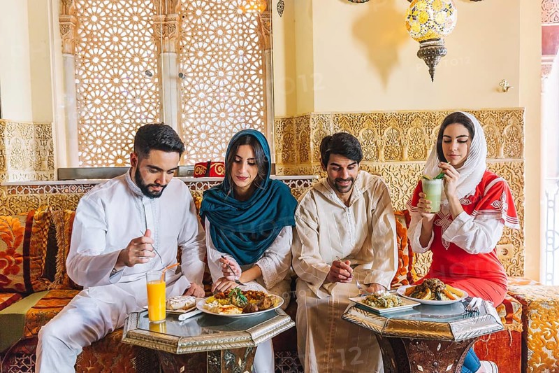 Group young muslim friends restaurant 2