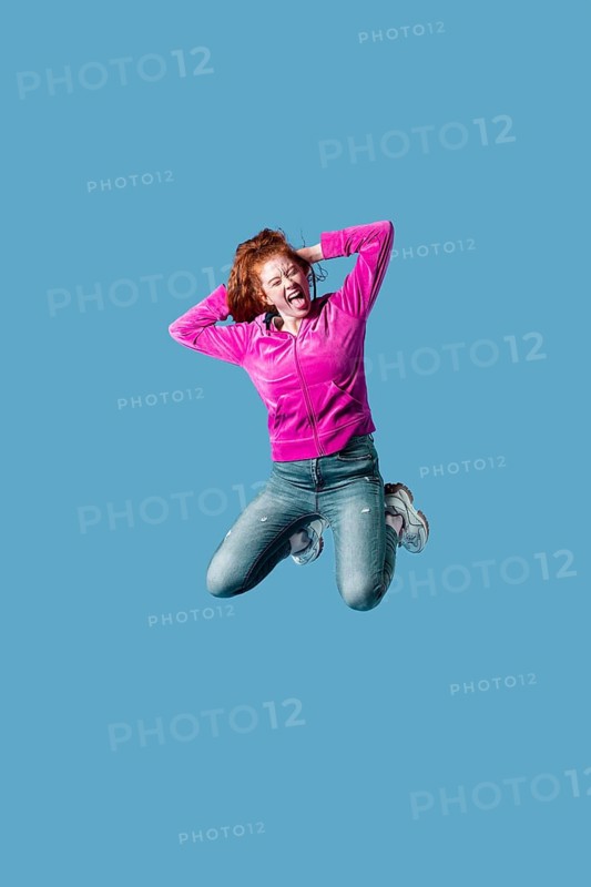 Happy young woman jumping 16