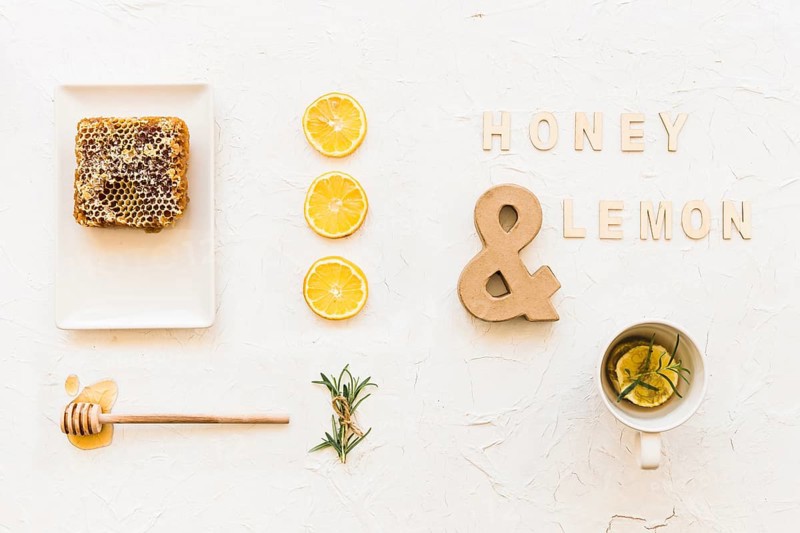 Honey lemon tea with honeycomb lemon slices rosemary