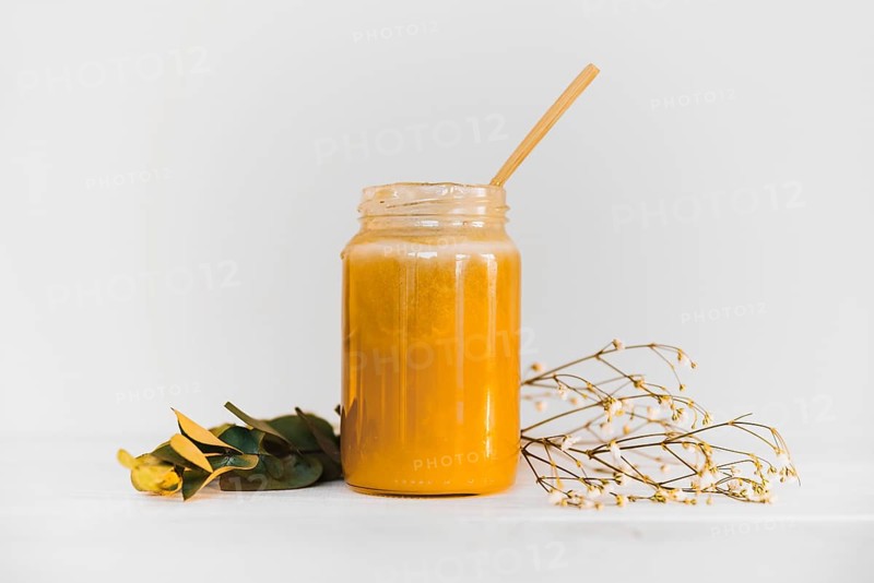 Jar lemon curd white background