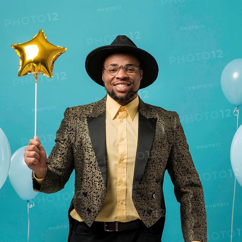 Man suit sunglasses party with balloon