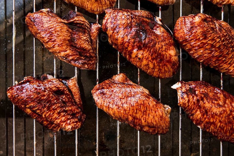 Overhead view delicious pieces chicken meat metal grill