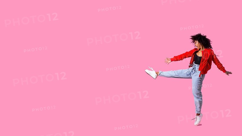 Portrait young female jumping 9
