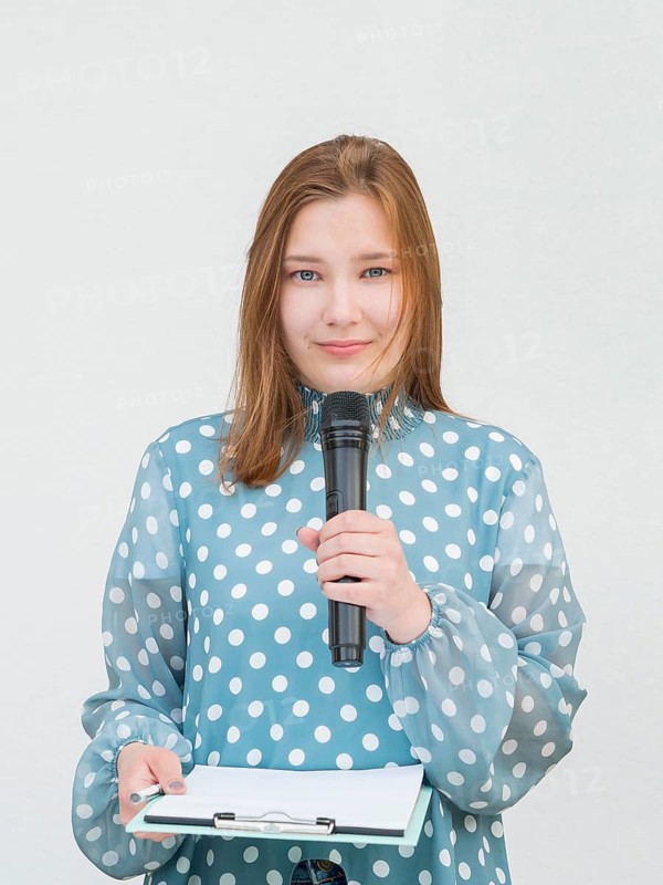 Reporter holding microphone front view
