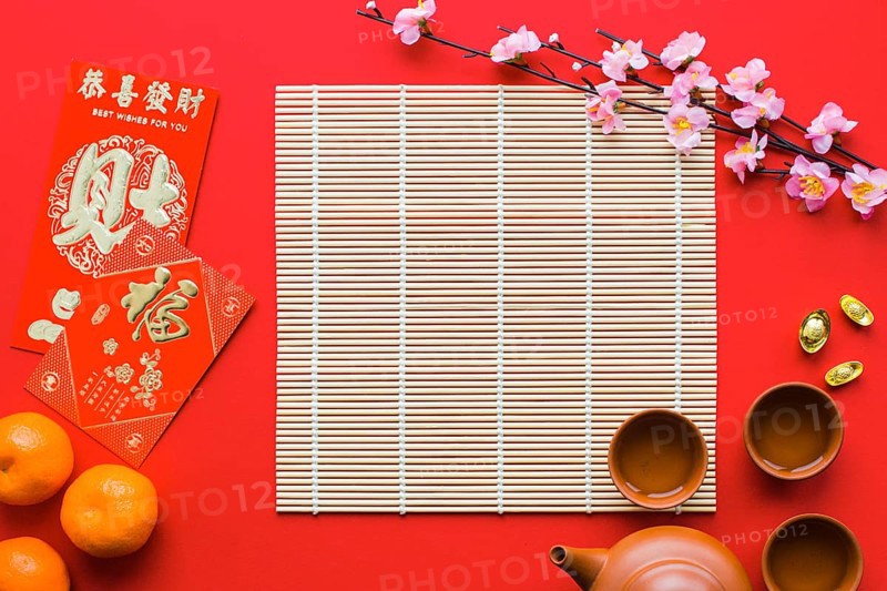 Sakura branch near tea ceremony stuff